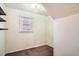 View of bedroom with window, and closet at 1805 W Stoll Pl, Denver, CO 80221