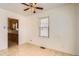 Dining area featuring tile floors and a ceiling fan at 1805 W Stoll Pl, Denver, CO 80221