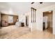 Bright living room with tile floors and an open layout at 1805 W Stoll Pl, Denver, CO 80221