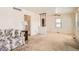 Bright living room with tile floors and an open layout at 1805 W Stoll Pl, Denver, CO 80221