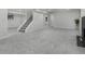 Spacious finished basement featuring neutral carpet, access to other rooms, and a cozy fireplace at 2203 S Harlan St, Denver, CO 80227