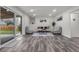 Inviting living room featuring a sliding door that provides seamless indoor-outdoor living at 2203 S Harlan St, Denver, CO 80227
