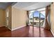 Bright room featuring hardwood floors and a sliding glass door out to a private balcony at 2 Adams St # 1507, Denver, CO 80206