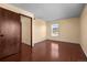 This bedroom provides plenty of space and natural light, with a view that enhances the room's appeal at 2 Adams St # 1507, Denver, CO 80206