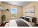 Comfortable bedroom featuring a view of the outdoors, combined with stylish decor for a relaxing atmosphere at 2 Adams St # 1507, Denver, CO 80206