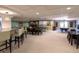 Spacious clubhouse featuring a lounge area, pool table and dining space, ideal for socializing and community events at 2 Adams St # 1507, Denver, CO 80206