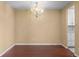 Dining room featuring hardwood floors and a view into the kitchen at 2 Adams St # 1507, Denver, CO 80206