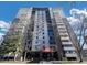 Modern high-rise condominium building featuring a welcoming entrance and private balconies at 2 Adams St # 1507, Denver, CO 80206