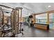 Well-equipped fitness center with modern equipment and a view of the indoor pool, promoting an active and healthy lifestyle at 2 Adams St # 1507, Denver, CO 80206