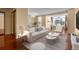 Modern living room with a large window, hardwood floors, and elegant decor at 2 Adams St # 1507, Denver, CO 80206