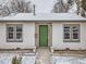 Close-up of the home's front entrance showcasing the green front door and house numbers at 1780 Oswego St, Aurora, CO 80010