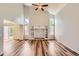 Spacious living room boasts vaulted ceilings and vinyl flooring throughout at 8750 Redwing Ave, Littleton, CO 80126