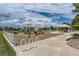 Playground with slides, swings, benches, pavilion, and safety ground cover at 8750 Redwing Ave, Littleton, CO 80126