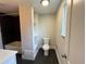 Modern bathroom featuring a combination shower and tub, and built-in shelves at 15908 E Flora Pl, Aurora, CO 80013
