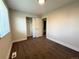 Bedroom with a window, closet and neutral carpet at 15908 E Flora Pl, Aurora, CO 80013