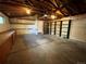 Garage with an overhead door and storage along the perimeter at 15908 E Flora Pl, Aurora, CO 80013