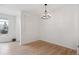 Well-lit dining room featuring neutral decor and hardwood floors at 8962 E Otero Pl, Centennial, CO 80112