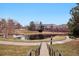 Scenic community pond offering a picturesque natural retreat and walkway in the complex at 8962 E Otero Pl, Centennial, CO 80112