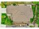 A high-angle view shows the roof, backyard, landscaping and hardscaping features surrounding the home at 24316 E Ottawa Ave, Aurora, CO 80016