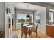 Cozy dining area with natural light and a view of the outdoor space at 24316 E Ottawa Ave, Aurora, CO 80016