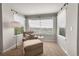 Bright sitting room featuring a chaise lounge, window and neutral decor at 24316 E Ottawa Ave, Aurora, CO 80016