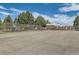 Community amenities include a full basketball court and playground that are ready for a new owner at 3663 S Sheridan Blvd # J12, Denver, CO 80235