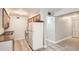 Cozy kitchen with appliances, ample counter space, and convenient layout at 3663 S Sheridan Blvd # J12, Denver, CO 80235