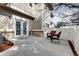 Back patio includes seating area and low-maintenance mulch landscaping at 10141 Autumn Blaze Trl, Highlands Ranch, CO 80129