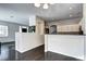 Inviting living room featuring an open layout to the dining area and kitchen at 10141 Autumn Blaze Trl, Highlands Ranch, CO 80129