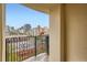 Private balcony showcasing wrought iron railing and unobstructed city skyline views at 300 W 11Th Ave # 5I, Denver, CO 80204
