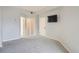 Spacious bedroom with neutral paint, carpet, doors, and closet at 300 W 11Th Ave # 5I, Denver, CO 80204