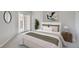 Stylishly decorated bedroom with balcony access and neutral color palette at 300 W 11Th Ave # 5I, Denver, CO 80204