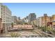 Expansive city view showcases surrounding buildings and vibrant neighborhood streets at 300 W 11Th Ave # 5I, Denver, CO 80204