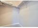 Walk-in closet space with simple shelving and ample storage potential at 300 W 11Th Ave # 5I, Denver, CO 80204
