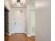 Hallway with hardwood floors and modern lighting at 300 W 11Th Ave # 5I, Denver, CO 80204