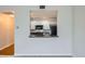 Compact kitchen with granite countertops and black appliances at 300 W 11Th Ave # 5I, Denver, CO 80204