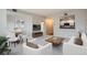 Cozy living room with modern decor, a dining area, and ample natural light at 300 W 11Th Ave # 5I, Denver, CO 80204
