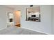 Open-concept living room with a view into the kitchen and the bathroom at 300 W 11Th Ave # 5I, Denver, CO 80204