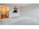 Spacious living room with modern gray walls and carpet, next to a compact kitchen area at 300 W 11Th Ave # 5I, Denver, CO 80204