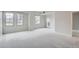 Spacious living room with large windows and ample natural light at 300 W 11Th Ave # 5I, Denver, CO 80204