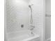 Bathroom showcasing subway tile in the shower at 7591 S Reed Ct, Littleton, CO 80128