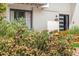 Attractive front of home with flower beds and modern design elements at 7591 S Reed Ct, Littleton, CO 80128