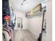 Spacious walk-in closet with ample storage and dressing mirror at 7591 S Reed Ct, Littleton, CO 80128