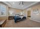 Secondary bedroom with en-suite bathroom and neutral decor at 14130 Double Dutch Cir, Parker, CO 80134