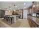 Spacious kitchen with granite countertops and island at 14130 Double Dutch Cir, Parker, CO 80134