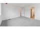 Spacious bedroom with neutral walls and plush carpet, offering a tranquil atmosphere at 9692 Cathay St, Commerce City, CO 80022