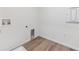 Functional laundry room with modern hookups and durable flooring, designed for efficiency at 9692 Cathay St, Commerce City, CO 80022