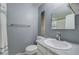 Cozy bathroom features gray walls, granite countertop and shower with curtain at 9031 E Amherst Dr # D, Denver, CO 80231