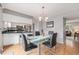 Contemporary dining area adjacent to the kitchen, great for entertaining guests at 9031 E Amherst Dr # D, Denver, CO 80231
