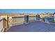 Enjoy scenic views from this back deck with a decorative railing at 9373 Pitkin St, Commerce City, CO 80022